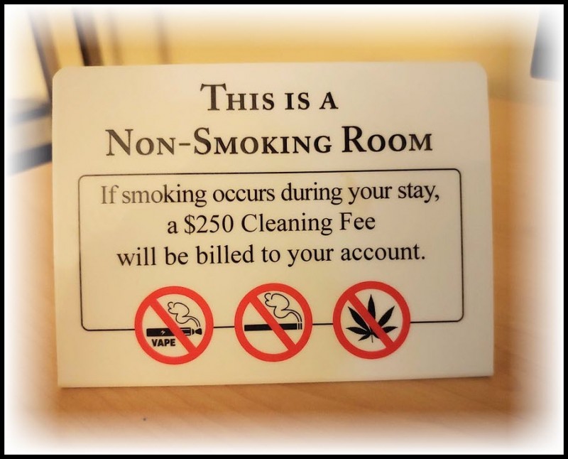 no smoking weed hotel room sign